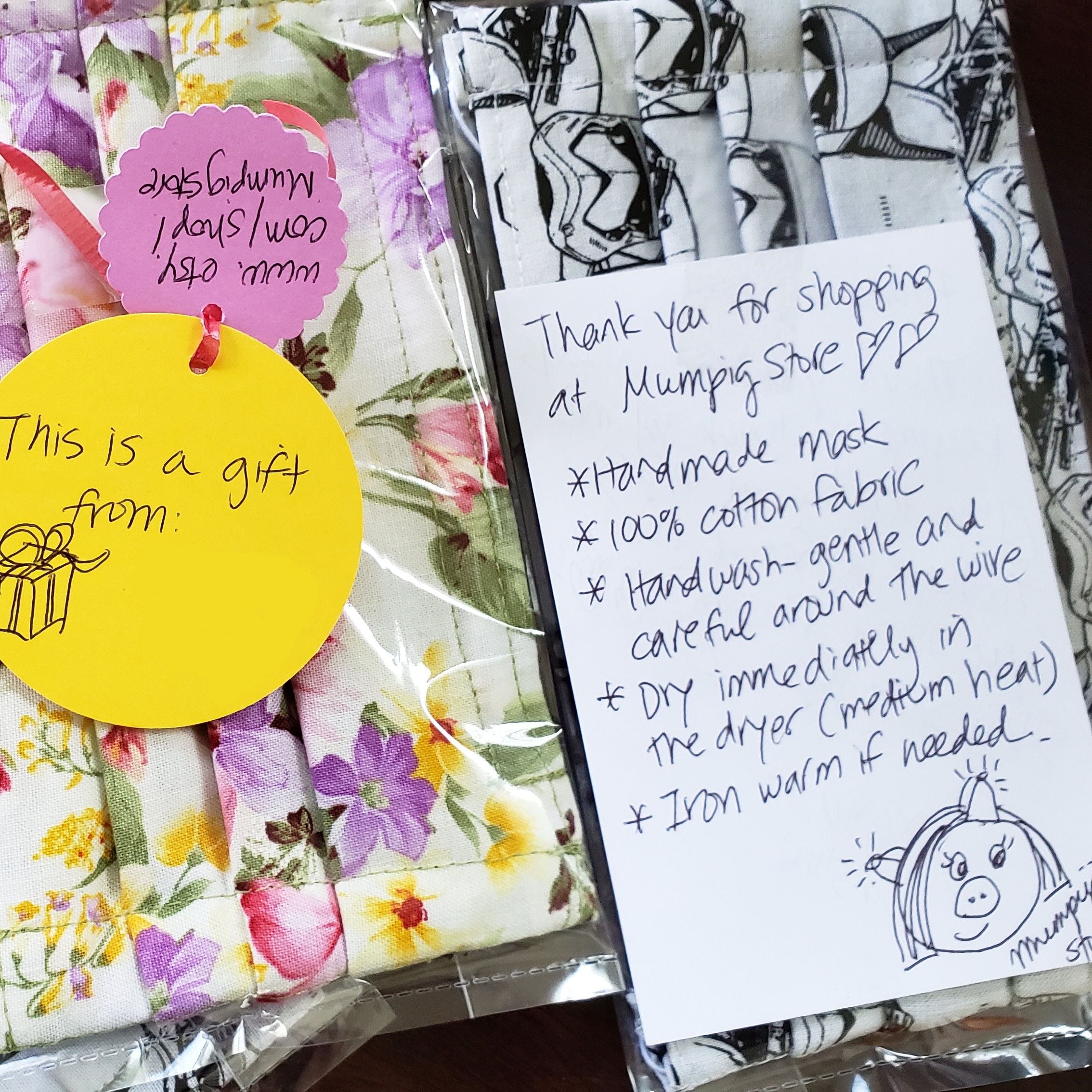 Handwritten note attached to homemade cotton masks